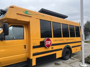 The side of a new electric school bus.