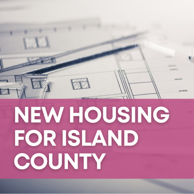 A photograph taken at a slanted angle of a blueprint with a house-shaped clear stencil over it forms a background to a magenta banner with white text that says "New Housing for Island County."